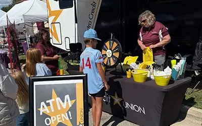 Extra Credit Union booth at outdoor event